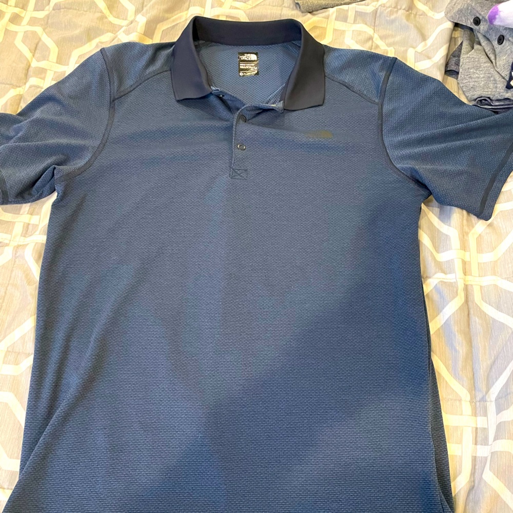 Northface Size M Dri-fit polo. Worn maybe once or twice.
